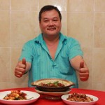 CHONG KWE FAA HOLDING MORE THAN 30 YEARS FOOD COOKING EXPERIENCE PRESENTING HIS SEAFOOD RECIPE